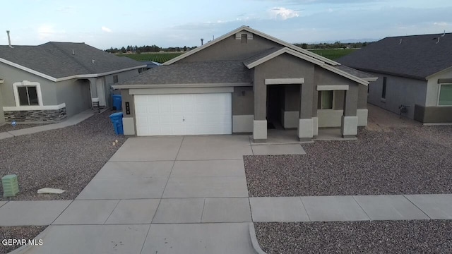 view of front of home with a garage