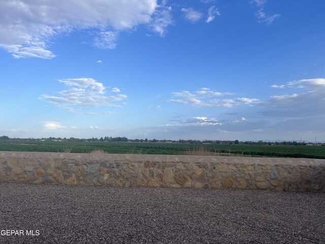 exterior space with a rural view