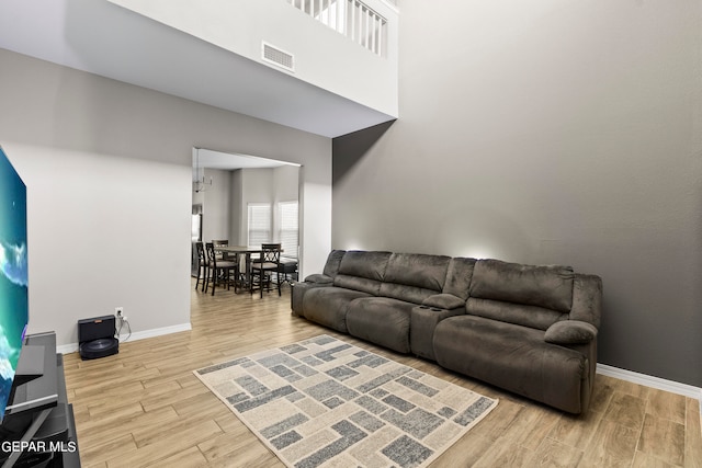 living room with light hardwood / wood-style floors