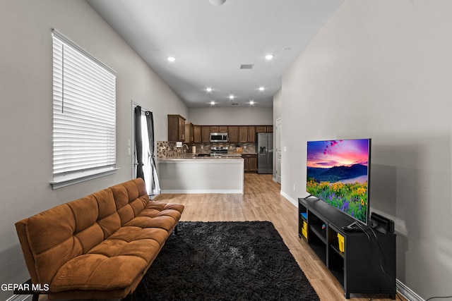 living room with light wood-type flooring