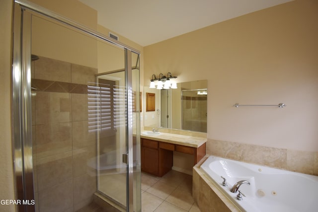 bathroom with vanity, independent shower and bath, and tile patterned floors