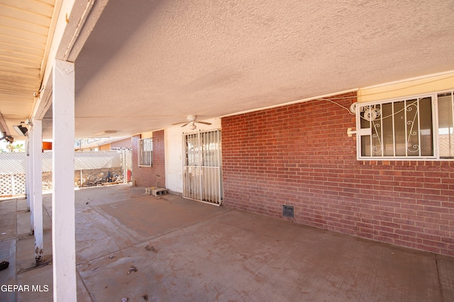 view of patio featuring ceiling fan