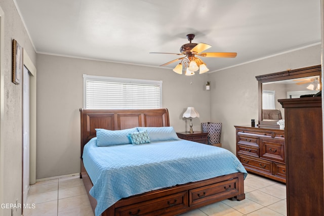 bedroom with light tile patterned flooring, ornamental molding, and ceiling fan