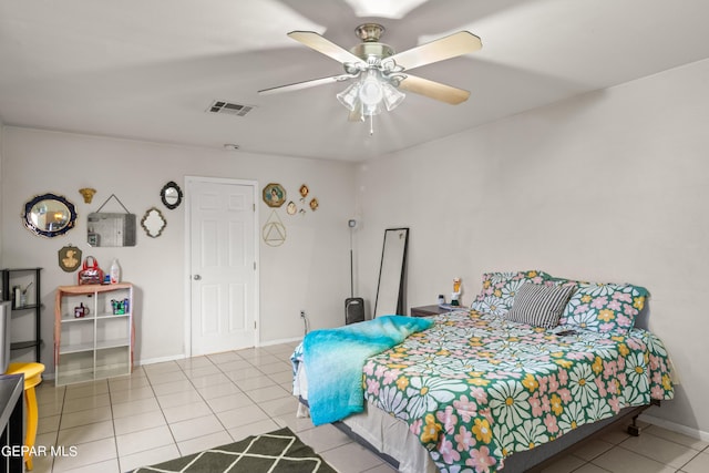 bedroom with light tile patterned floors, baseboards, visible vents, and a ceiling fan