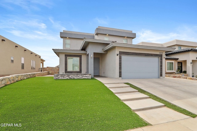 view of front facade featuring a garage and a front yard