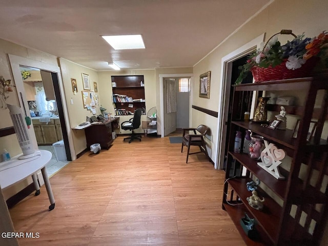 sitting room featuring light wood-type flooring