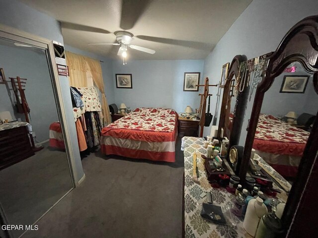 bedroom with a closet, carpet floors, and ceiling fan