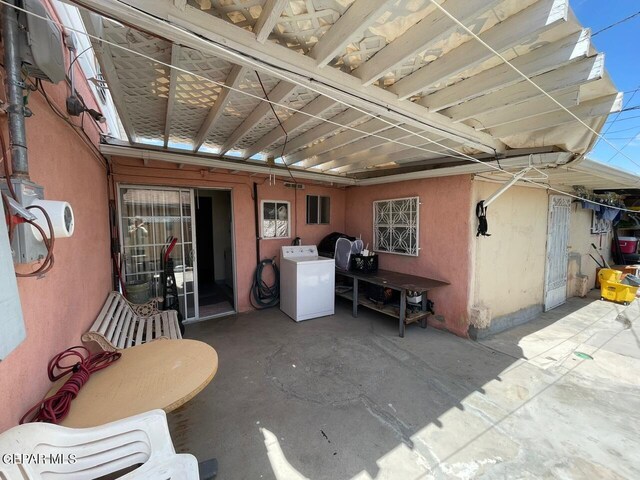 view of patio / terrace featuring washer / clothes dryer