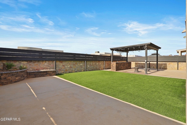 view of yard featuring a gazebo and a patio area