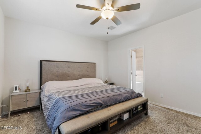 bedroom featuring carpet flooring, ceiling fan, and ensuite bath