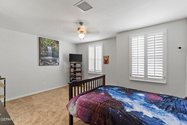 bedroom featuring carpet flooring and ceiling fan