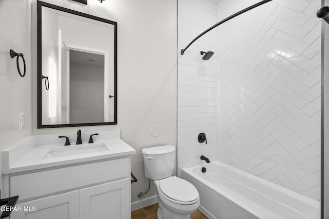 bathroom with bathing tub / shower combination, vanity, toilet, and baseboards