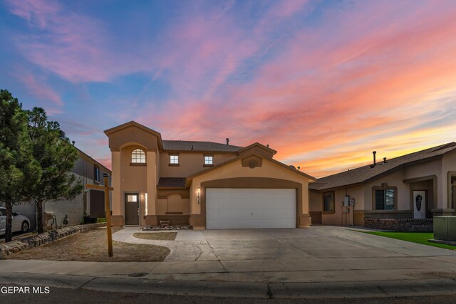 view of front of home with a garage