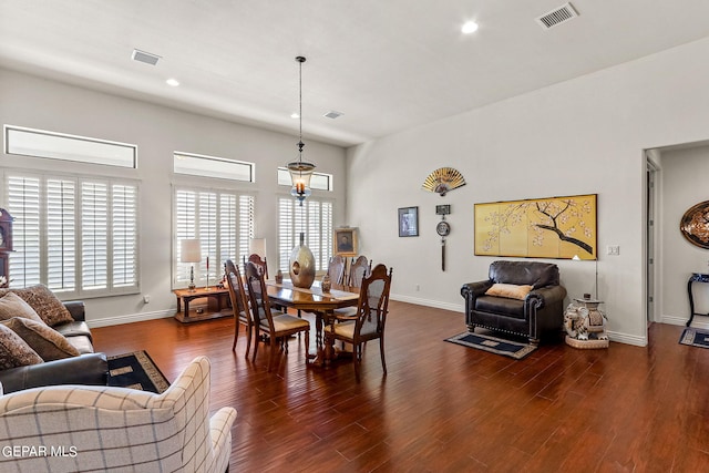 dining room with dark wood-type flooring