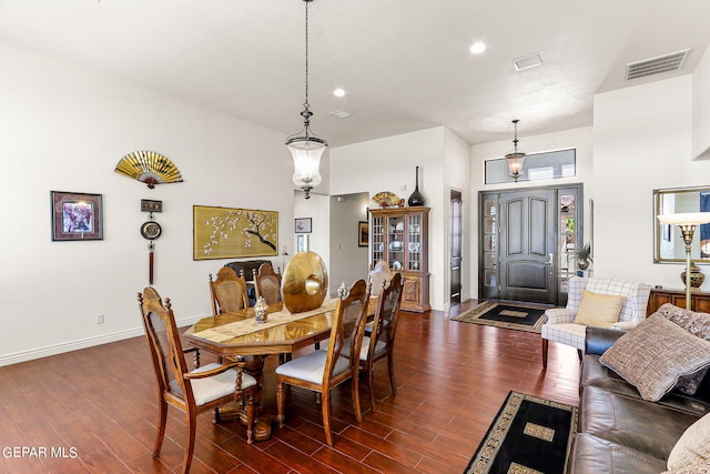 dining area featuring dark hardwood / wood-style floors