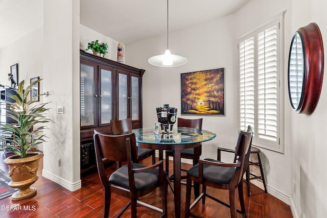 dining room featuring dark hardwood / wood-style flooring