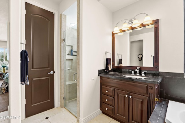 bathroom with shower with separate bathtub, tile patterned flooring, and vanity