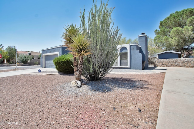 view of front of property featuring a garage