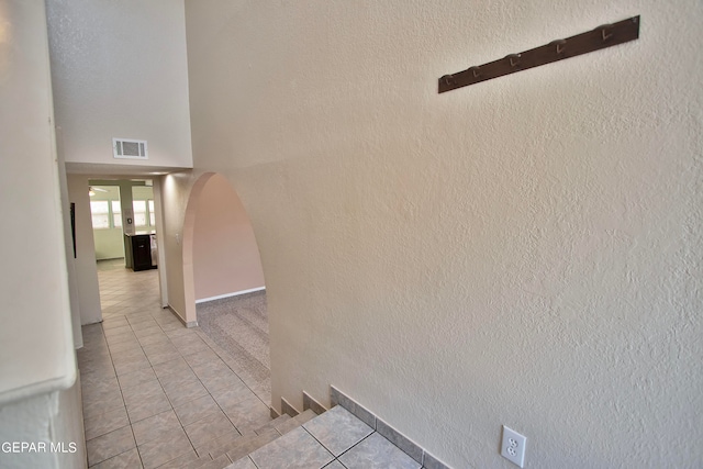 interior space with light tile patterned floors