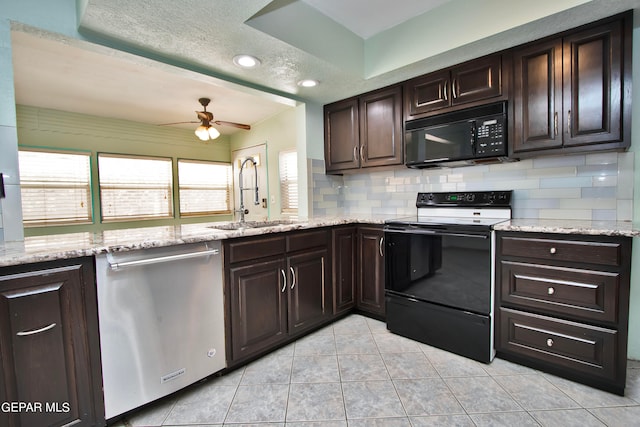 kitchen with dark brown cabinets, ceiling fan, sink, backsplash, and black appliances