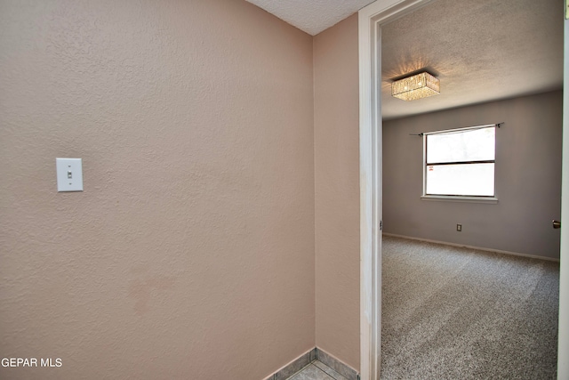 interior space with a textured ceiling