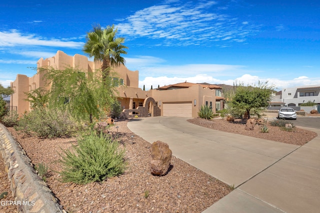 adobe home with a garage