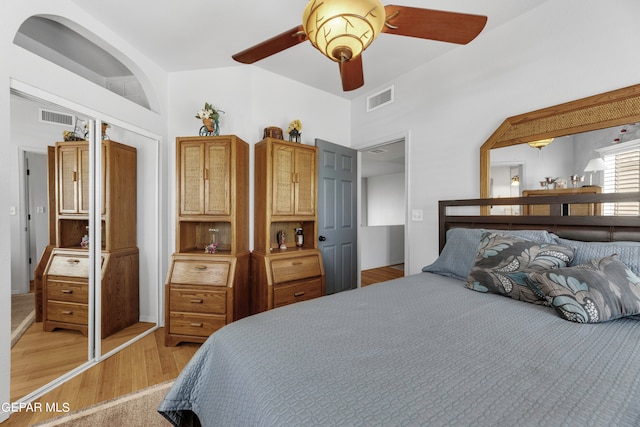 bedroom featuring ceiling fan and light hardwood / wood-style flooring