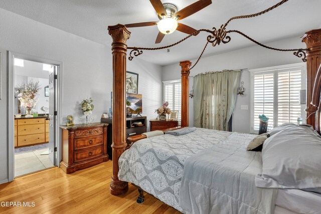 bedroom with ceiling fan and light hardwood / wood-style flooring