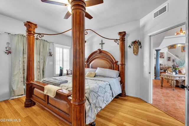 bedroom featuring ceiling fan and light wood-type flooring