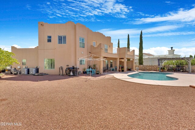 view of pool with a gazebo, central air condition unit, and a patio