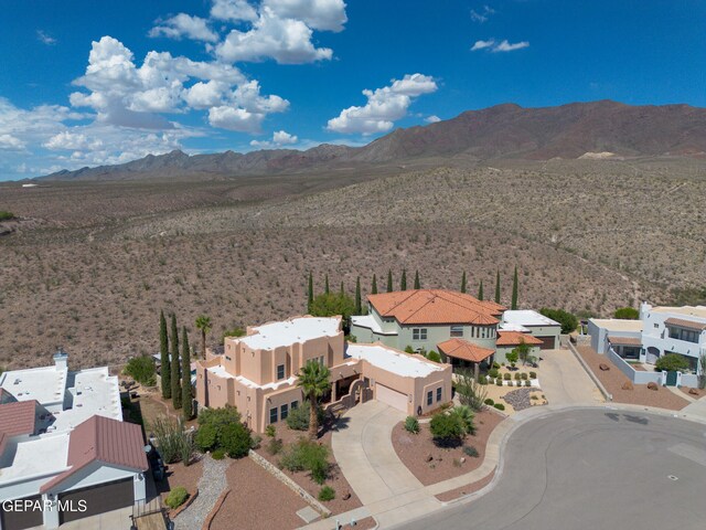 drone / aerial view featuring a mountain view