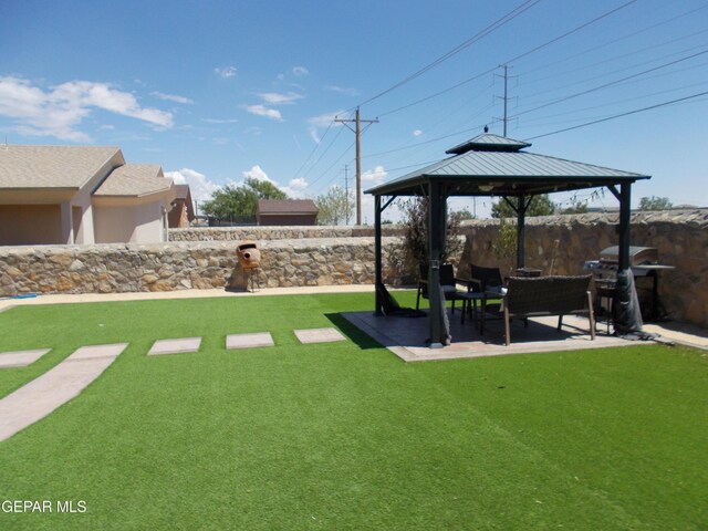 view of yard with a patio area and a gazebo