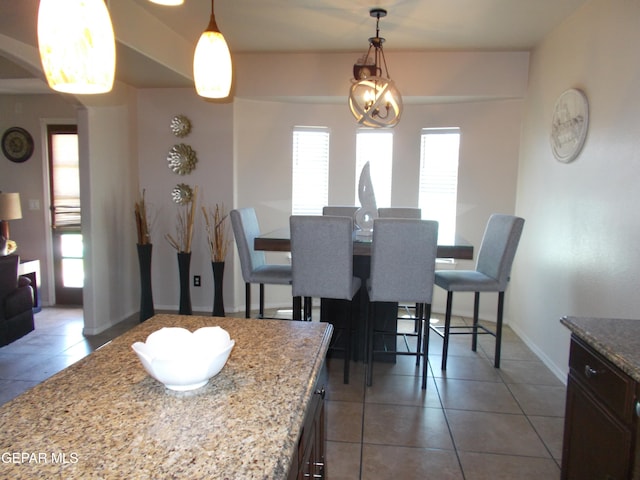 dining room with light tile patterned floors