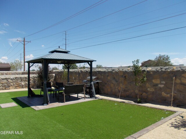 view of yard featuring a patio and a gazebo