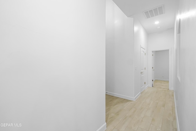 corridor featuring light wood-type flooring