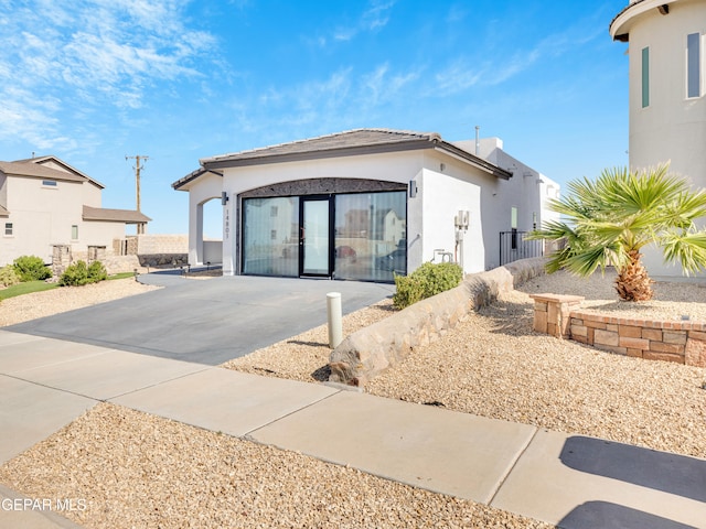 view of front of property with a patio area