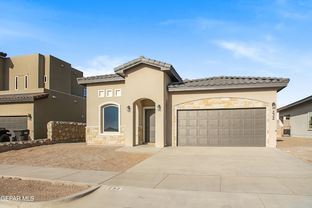 view of front of property featuring a garage