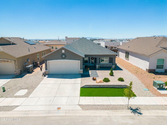 view of front of property featuring a garage