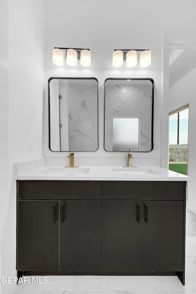 bathroom featuring double vanity and tile patterned flooring