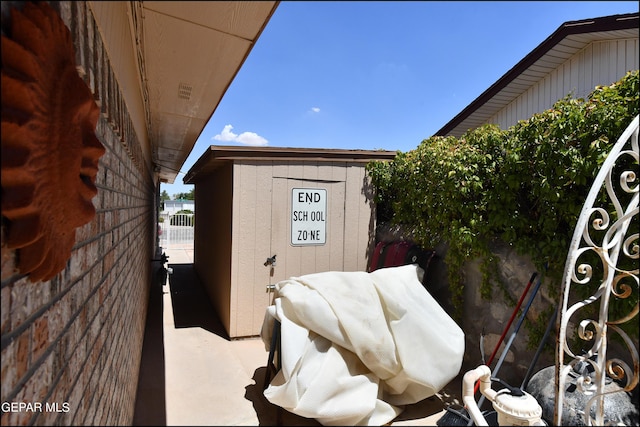 exterior space with a shed and an outdoor structure