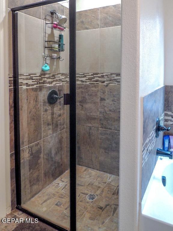 bathroom with an enclosed shower