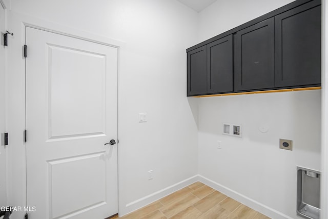 laundry area with gas dryer hookup, light hardwood / wood-style flooring, cabinets, hookup for a washing machine, and electric dryer hookup