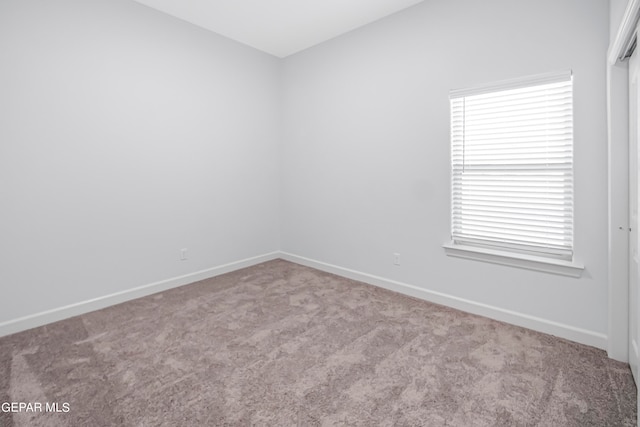 view of carpeted spare room