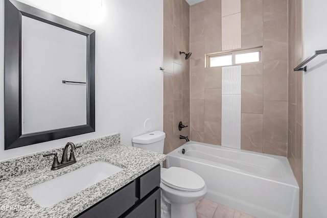 full bathroom with vanity, tiled shower / bath combo, toilet, and tile patterned floors