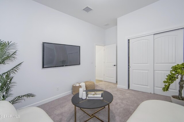 living room with light carpet