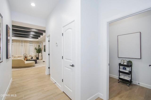 corridor featuring light hardwood / wood-style flooring