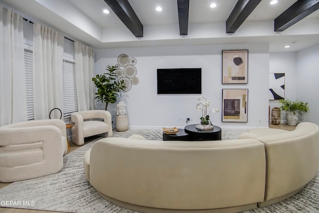 living room with beamed ceiling