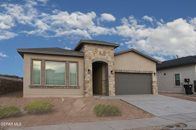 view of front of home with a garage