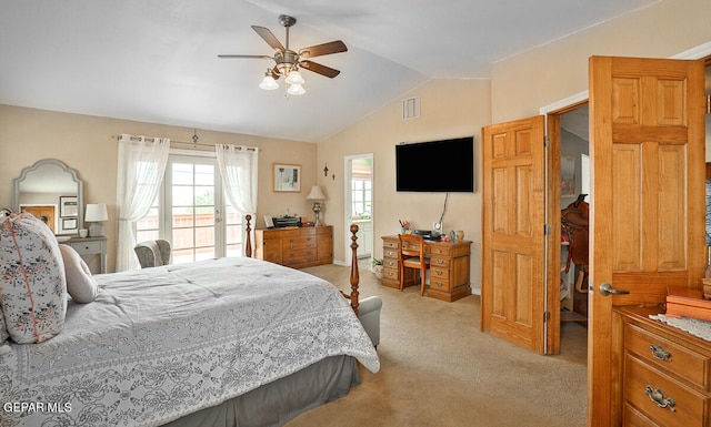 bedroom with ceiling fan, light colored carpet, and lofted ceiling