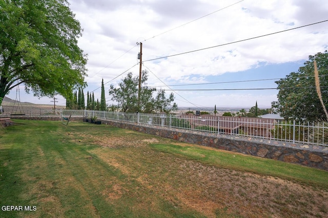 view of yard featuring fence